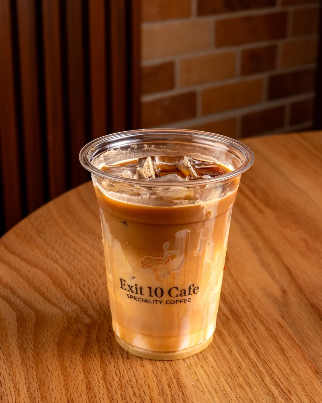 An Iced Spanish Latte in an Exit 10 cup