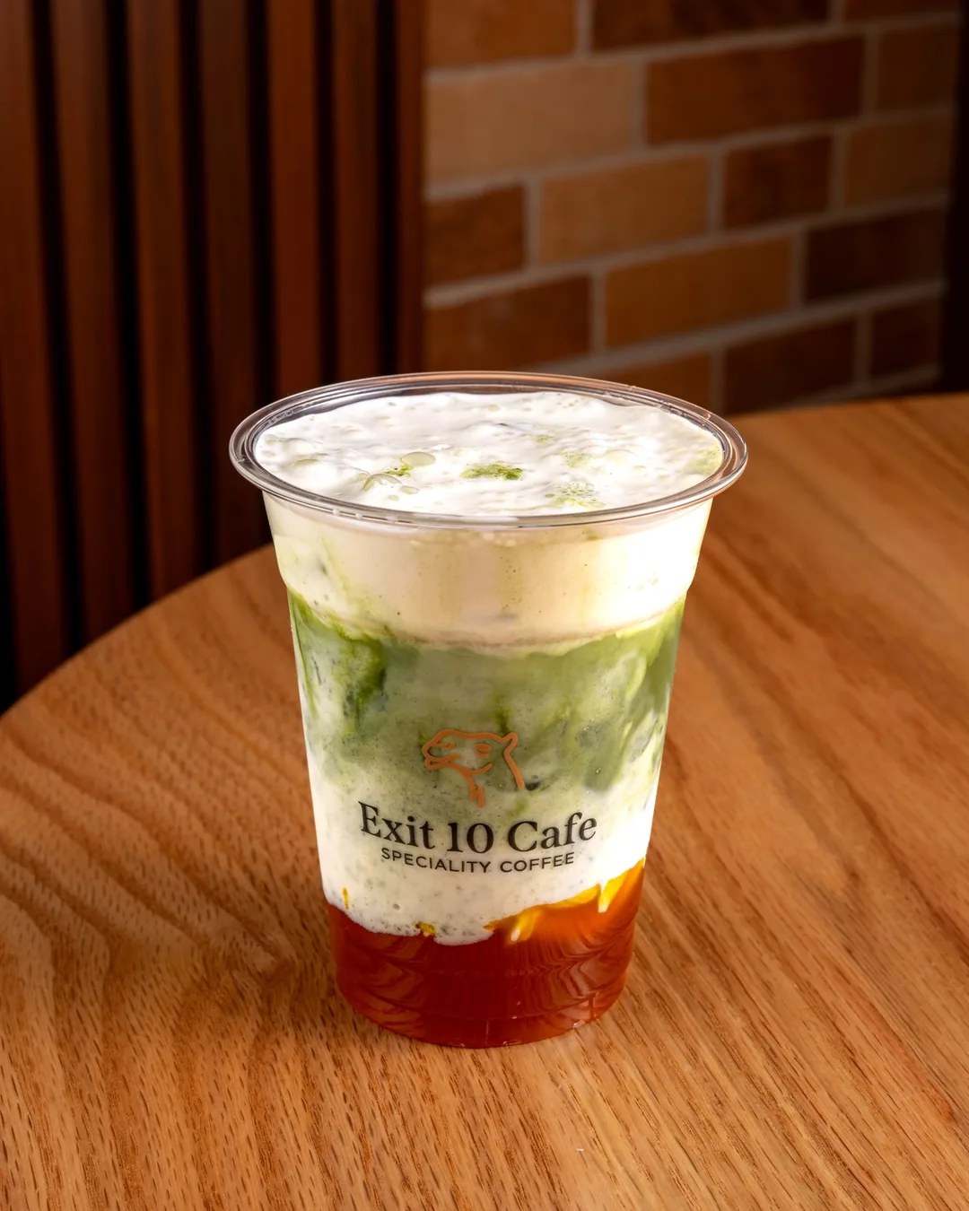 Strawberry matcha in layers of red, cream and green
